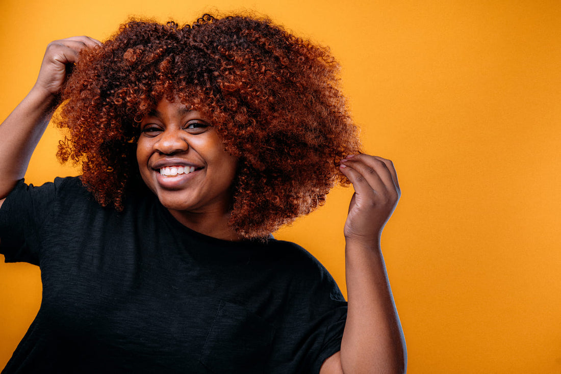 woman with color treated natural hair