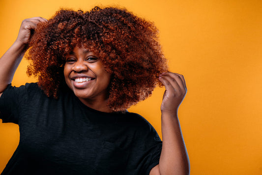 woman with color treated natural hair